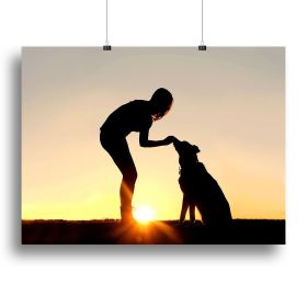 A silhouette of a girl sitting outside in the grass with her pet German Shepherd Mix Dog feeding him treats during training in front of a sunsett (Type: Poster Print, size: 24" x 16" / 60cm x 40cm (approx))